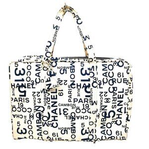 Authentic CHANEL Rue Cambon Travel Bag Vintage White & Navy Canvas